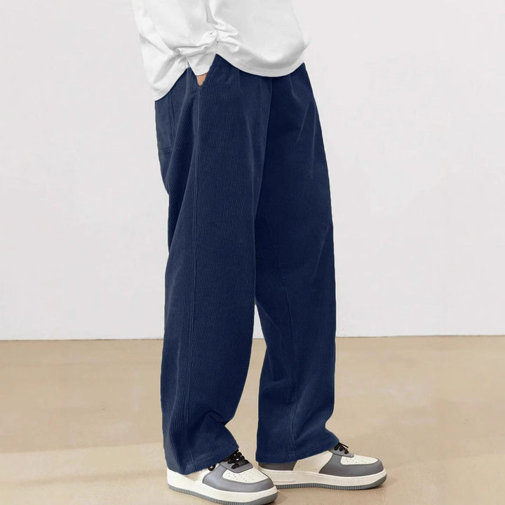Versatile men's wide leg pants with elastic waist for casual comfort & modern relaxed fit.