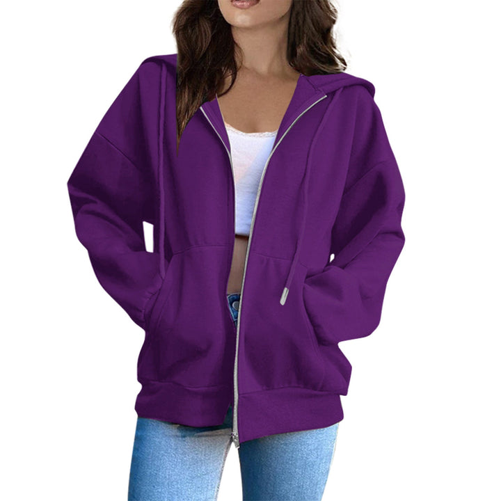 Soft & cozy women's oversized hoodie with practical kangaroo pockets. Casual versatile style.