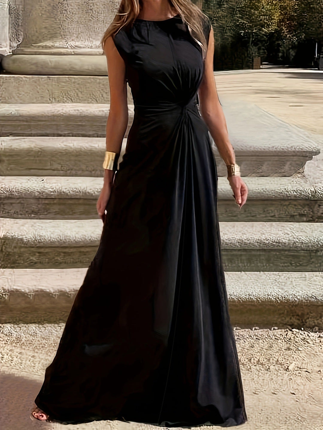 Elegant women's party dress, with delicate pleats and a flattering figure-hugging design.