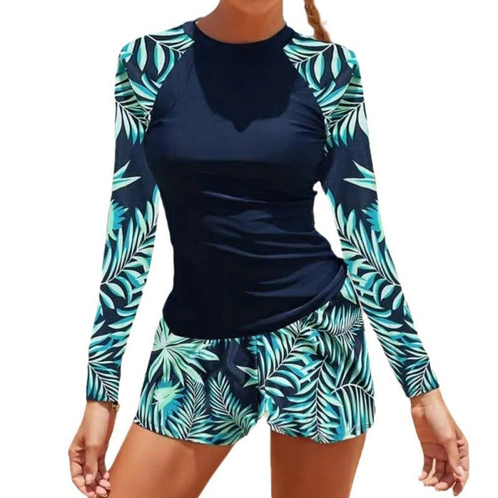 Women's long sleeve beachwear, a rash guard style swimsuit with a beautiful leaf print.