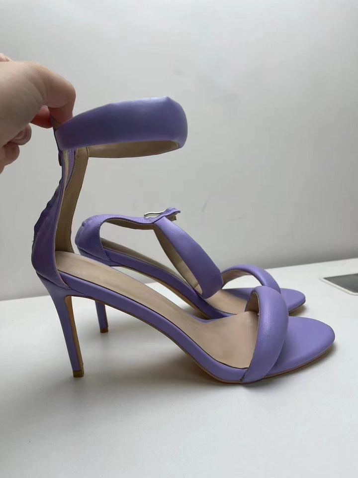 Sleek women's stiletto sandals, perfect elegant footwear with an ankle strap for formal events.