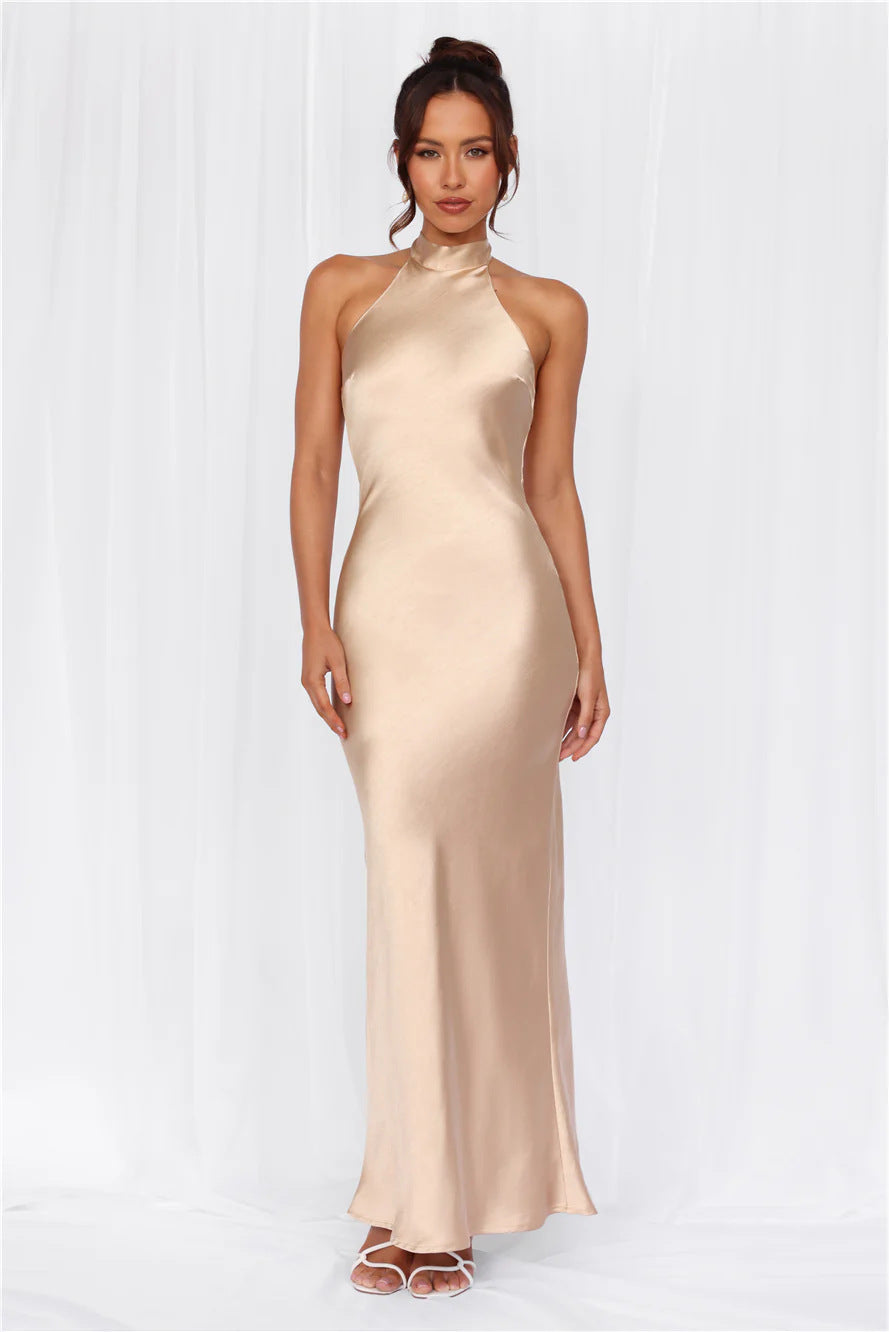 Women's elegant shimmering high neck formal gown, a stylish maxi dress for evening parties.