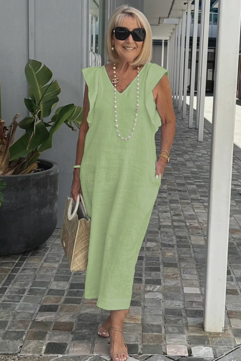 Women's summer maxi dress, sleeveless with a V-neck, offering elegant flow and comfort for casual or vacation.