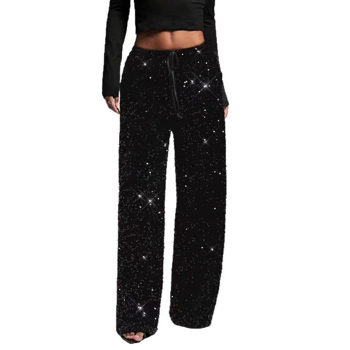 Shimmering sequin palazzo pants, elegant sparkle bottoms for a sophisticated party look.