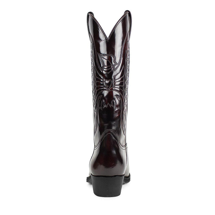 Detailed view of robust unisex western boots. High-quality cowboy rider footwear, durable & stylish.