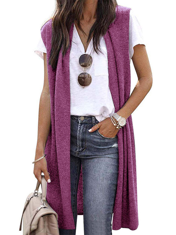 Flat lay: Women's elegant long vest, emphasizing its versatile layering potential and chic design.