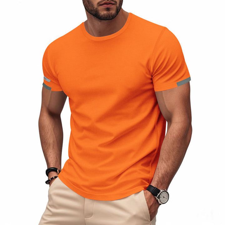 Men's activewear t-shirt. Breathable, quick-dry fabric ensures comfort for any workout or sport.