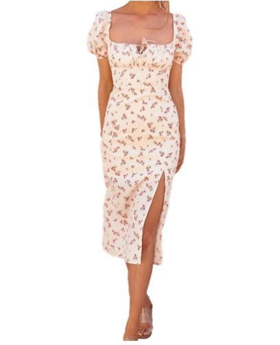 Women's floral puff sleeve midi dress, perfect for elegant spring fashion or chic summer casual wear.