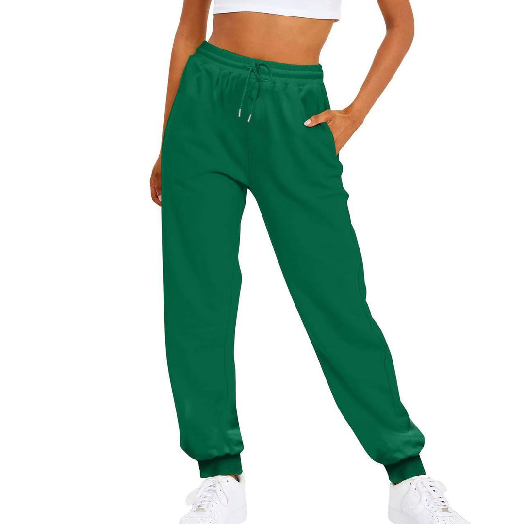 Modern women's comfortable pants, elastic waist joggers & side pockets, blending style with practicality.