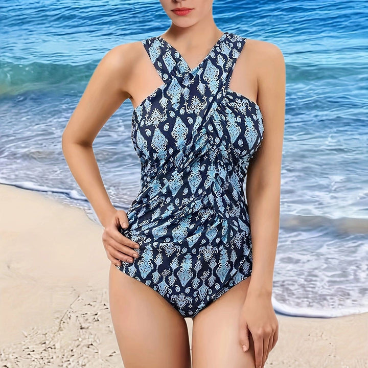 Comfortable women's one-piece halter swimsuit, ruched for a flattering fit, great for summer fun.