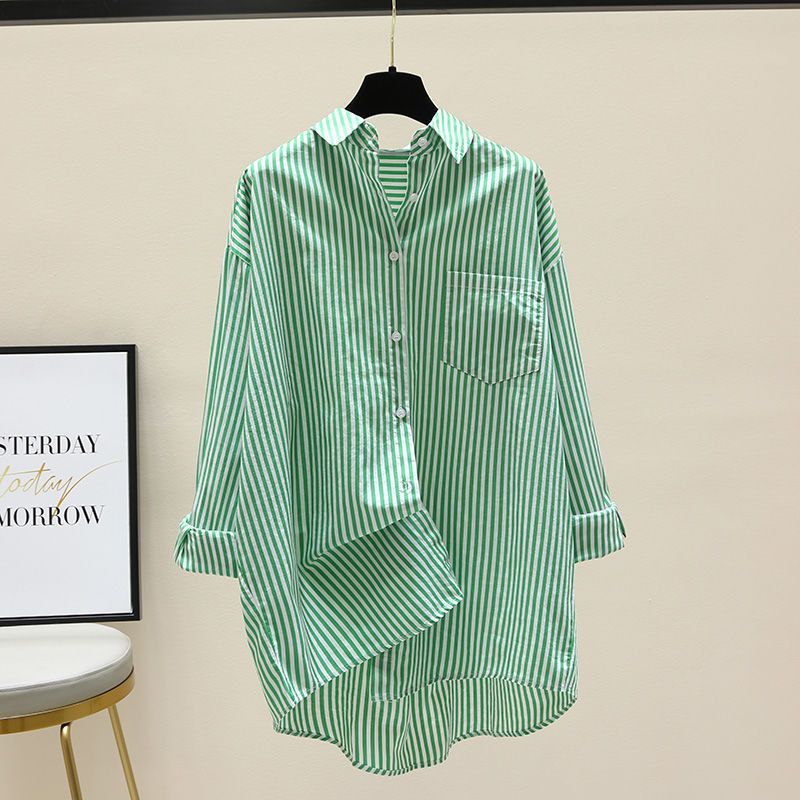 Relaxed fit women's striped blouse, an oversized long-sleeve top with a modern longer back hem.