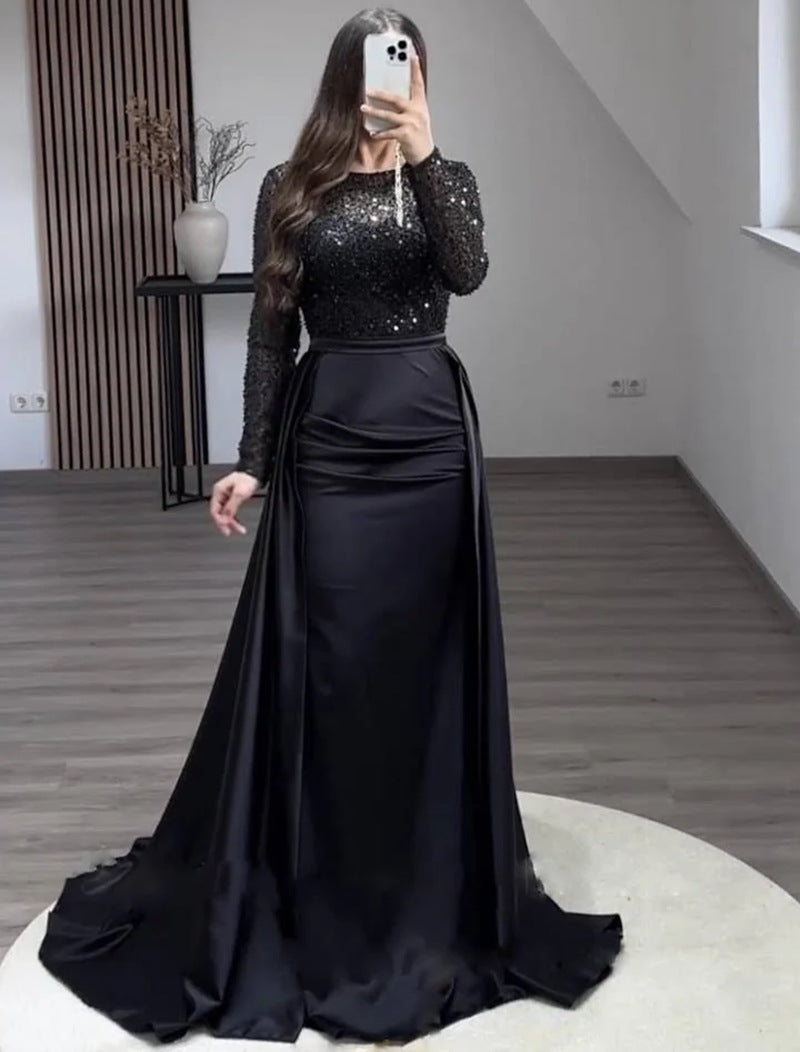 Sophisticated women's shimmer long-sleeve evening gown. Perfect elegant dress for formal events.