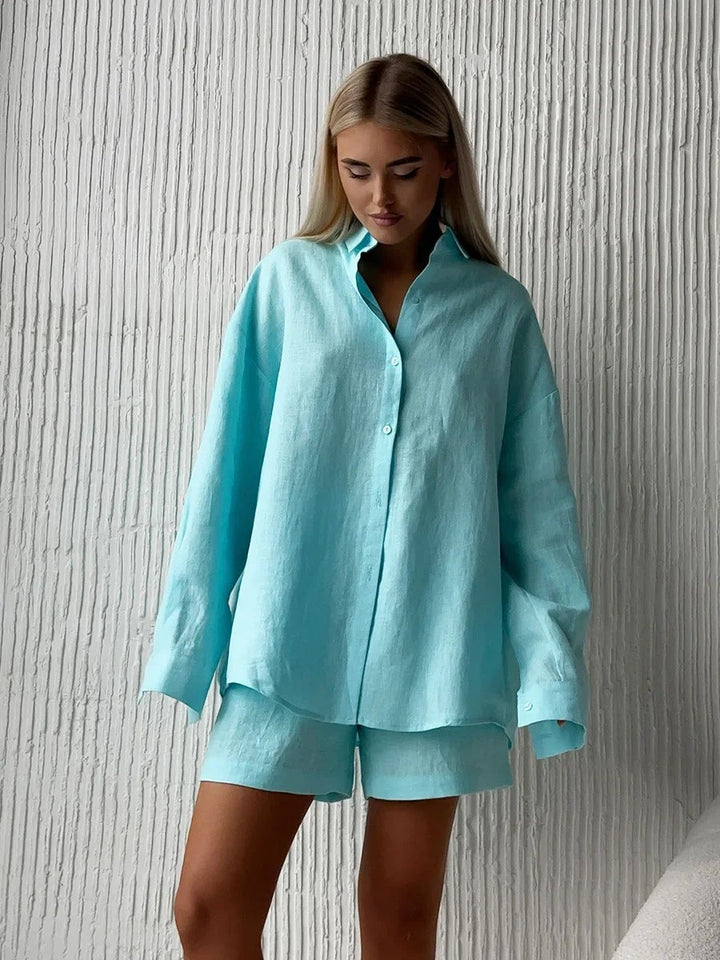 Fashionable women's casual summer set: stylish blouse and shorts. Great for beach or everyday activities.