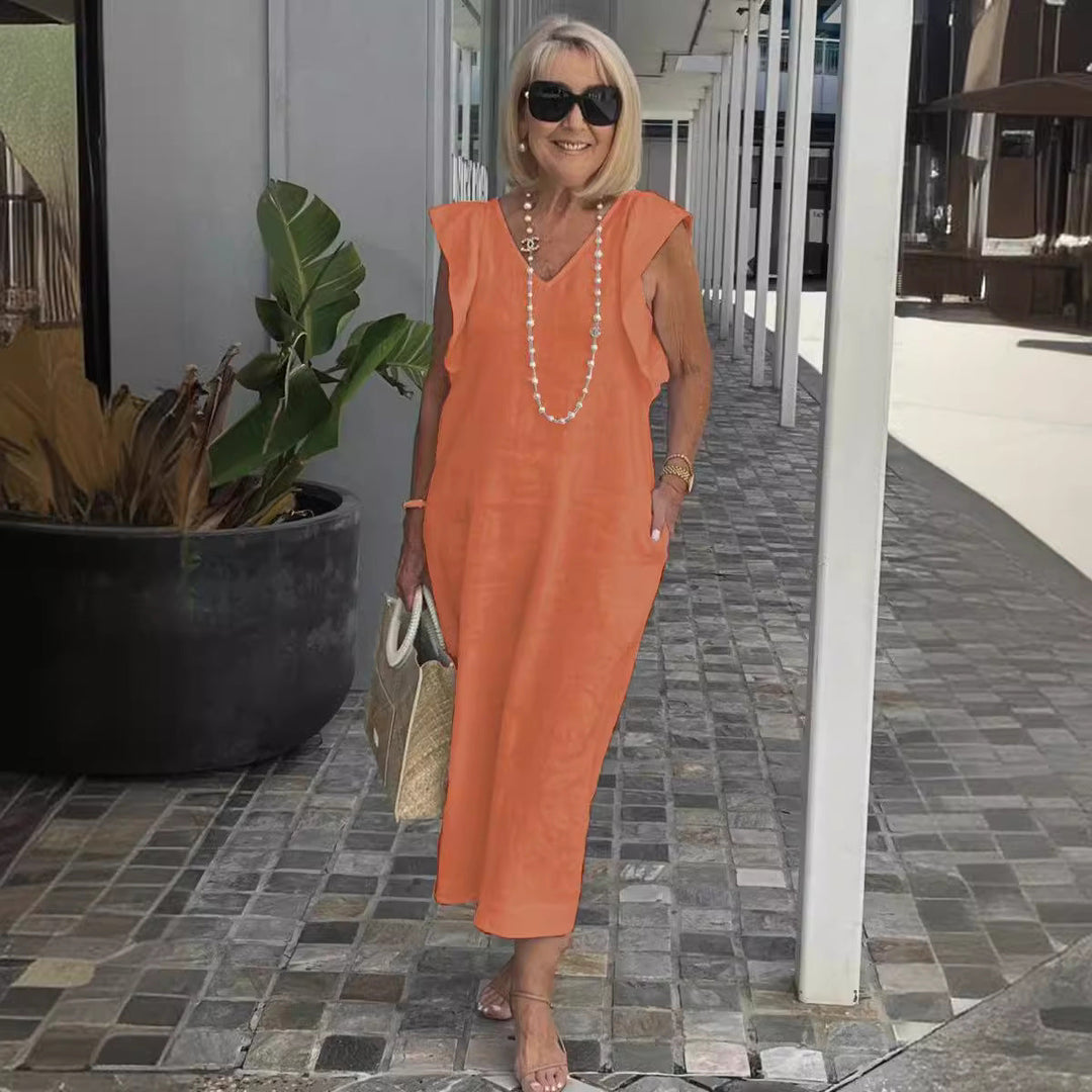 Black elegant sleeveless women's dress, a chic V-neck maxi perfect for summer evenings or vacation.