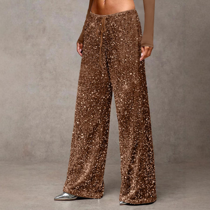 Sparkly sequin wide-leg trousers, perfect for festive outfits and chic party wear.