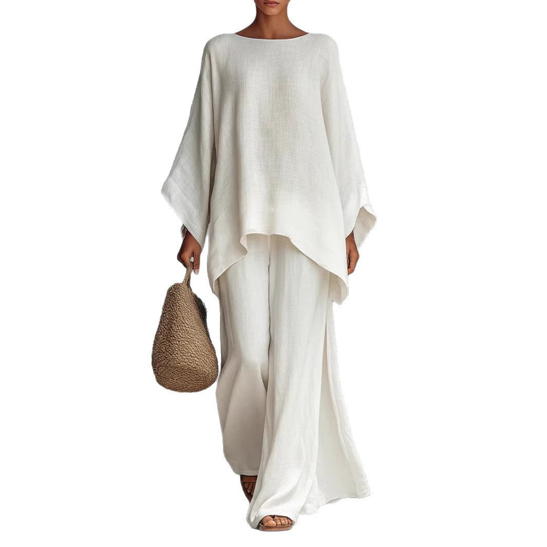 Comfortable women's two-piece set featuring a loose fit top and wide leg pants made from soft, airy fabric.