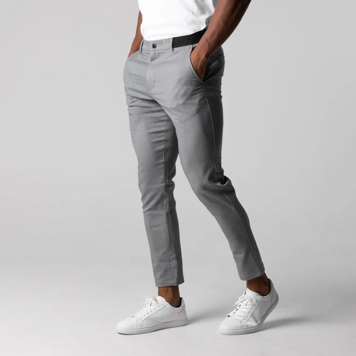 Versatile men's slim fit chino pants with elastic waist, perfect bottoms for smart casual everyday outfits.