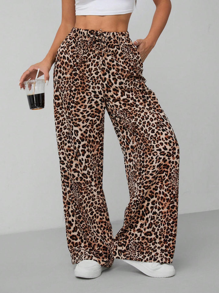 Vibrant pattern women's wide leg pants, loose fit, elastic waist, ideal for casual fashion.