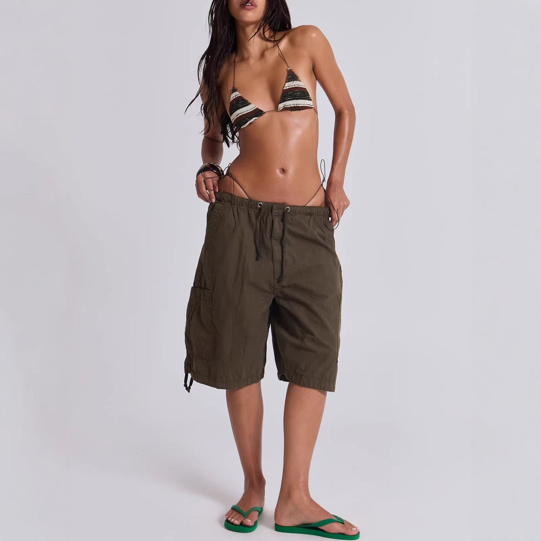 Stylish women's utility cargo shorts featuring an adjustable waist for a custom, comfortable fit. Ideal for summer.
