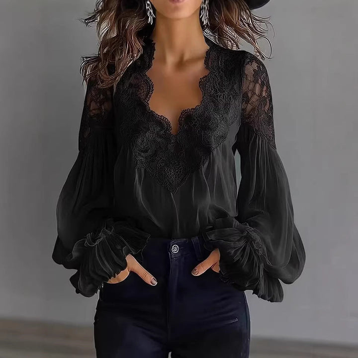 Chic white lace blouse for women, featuring delicate ruffle sleeves and a flowing design for summer style.