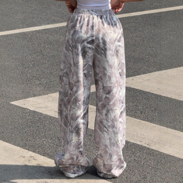 Soft, flowy women's printed wide leg pants with an elastic waist, offering ultimate comfort and style.