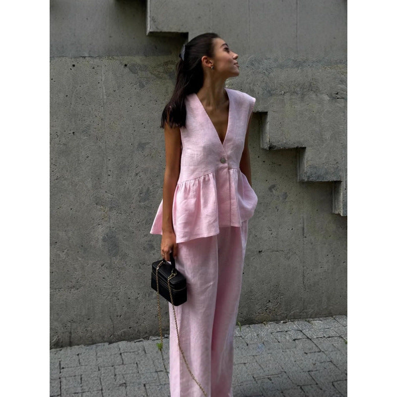 Women's casual V-neck top & wide-leg pants set, comfortable for summer lounging.