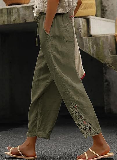 Chic boho-style embroidered women's trousers, excellent for a comfortable and fashionable vacation outfit.