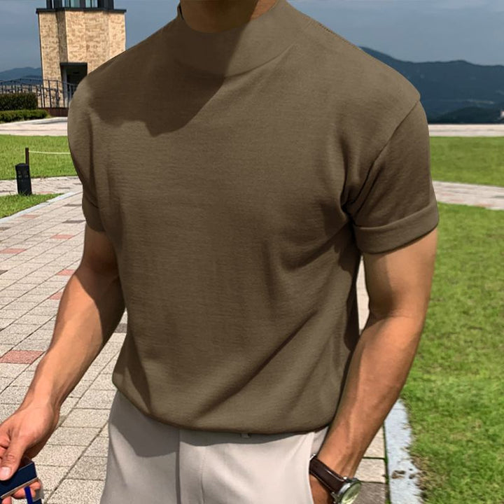 Modern men's apparel: high collar short sleeve t-shirt. Effortless style for casual occasions.