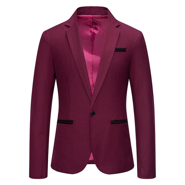 Sophisticated men's black blazer, a stylish suit jacket with contrasting lapels for elegant business attire.