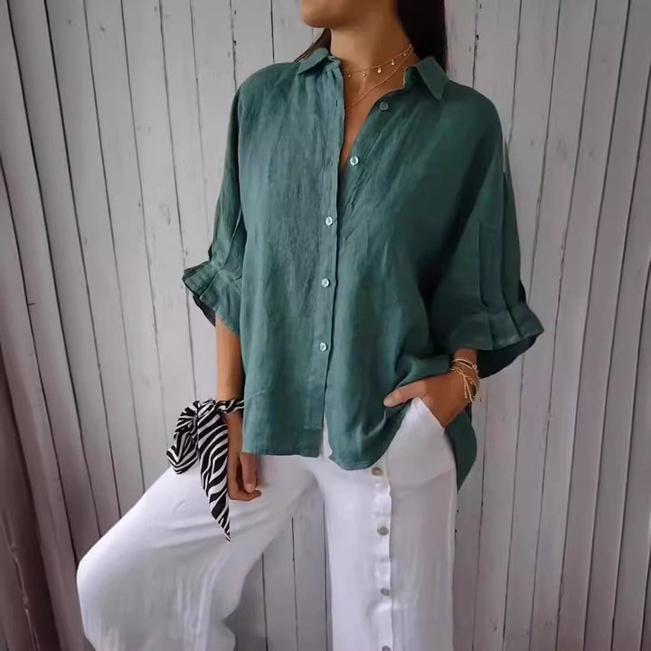 Elegant breathable women's blouse, offering effortless style and comfort.