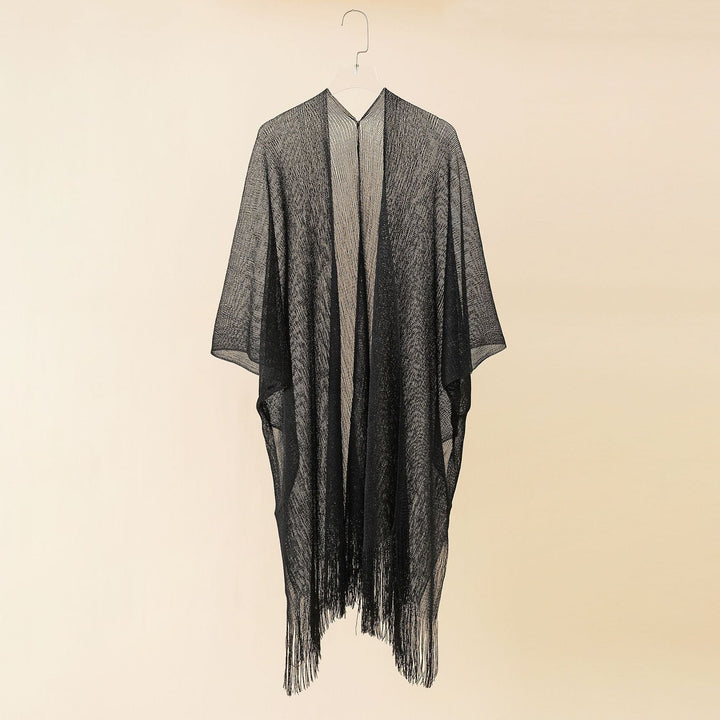 Women's bohemian fringe kimono, lightweight and chic, perfect for resort style.