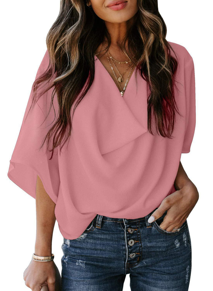 Stylish women's V-neck blouse with elegant draping, loose sleeves, perfect for office or casual spring fashion.