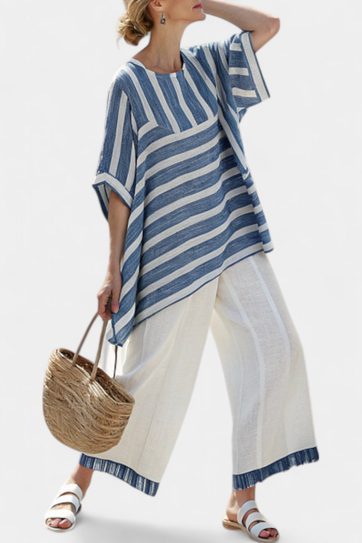 Women's blue striped summer top and pants matching set for a comfortable and elegant vacation or beach outfit.