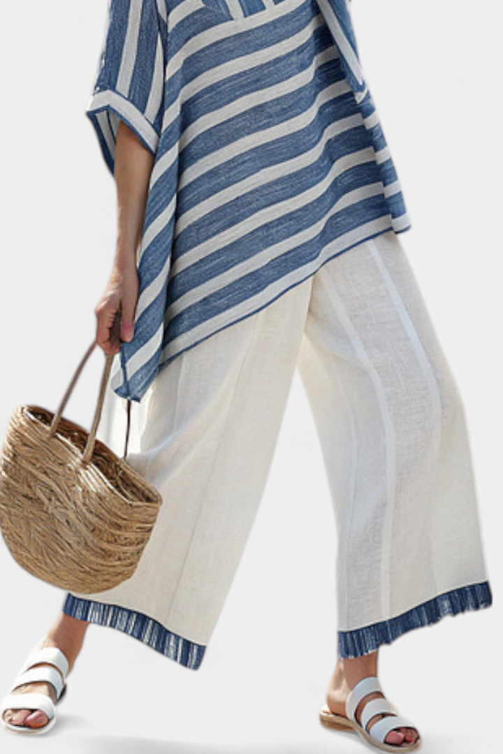 Elegant women's blue striped top & pants summer set, a comfortable and fashionable matching outfit for any occasion.