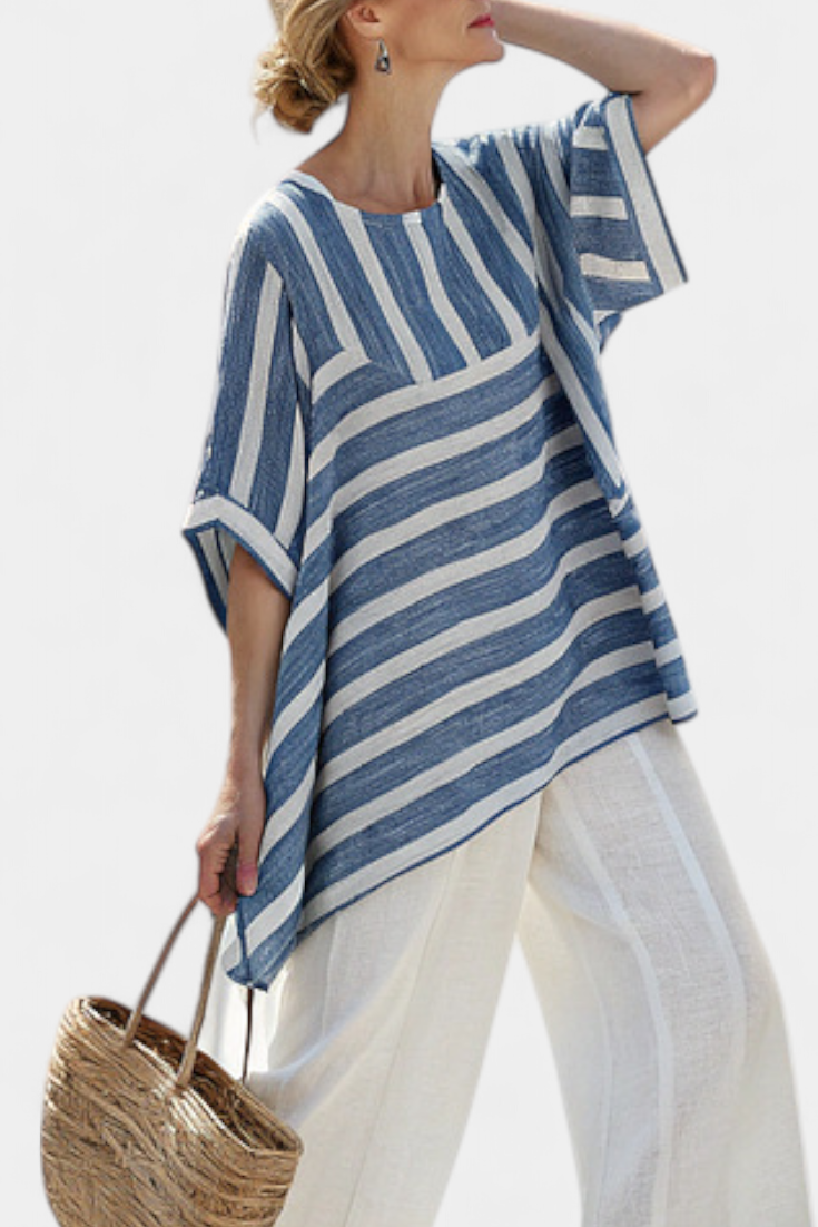 Stylish women's two-piece blue striped summer set, perfect casual wear for resort, beach, or everyday fashion.