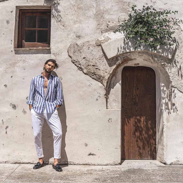Lightweight & breathable men's striped button-up shirt, short sleeve, relaxed fit, perfect for warm summer days.