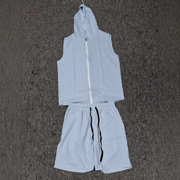 Sporty men's sleeveless zip-up hoodie & comfy shorts set. Great for casual summer outfits.
