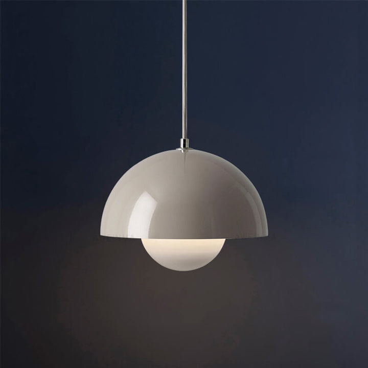 Elegant Scandinavian ceiling pendant, a timeless dome lamp for dining areas.