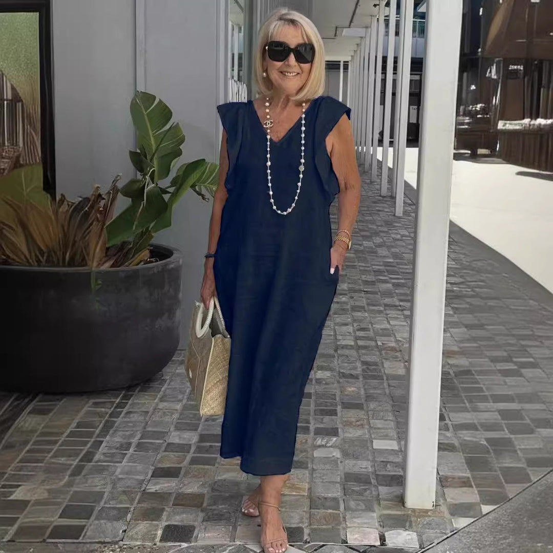 Apricot V-neck sleeveless maxi dress for women, offering elegant comfort and a flowy summer style.