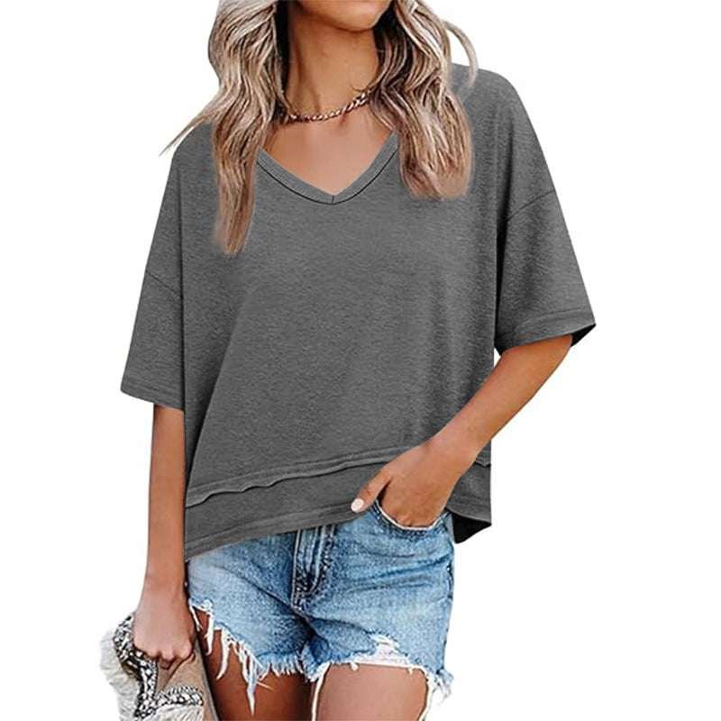 Comfortable oversized V-neck tee for women, perfect for relaxed casual wear and everyday spring/summer style.