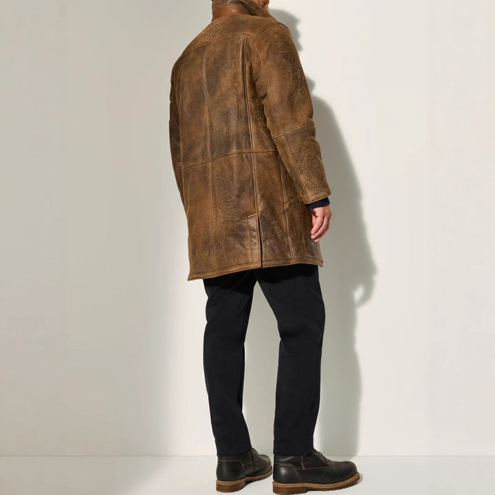 Comfortable & stylish men's long winter coat. Elegant brown premium outerwear for cold weather fashion.