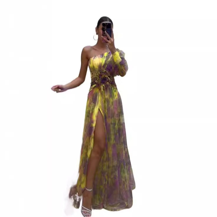 Fashionable women's glamorous one-shoulder evening gown with a unique asymmetric floral design, ideal for formal wear.