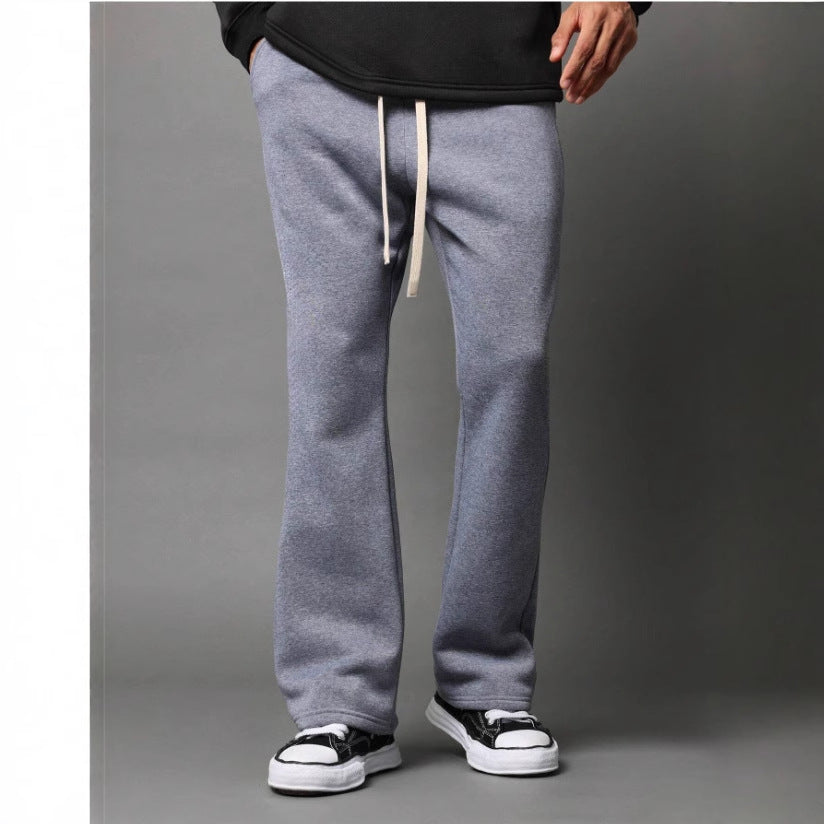 Stylish men's flared loungewear sweatpants with an adjustable waist for ultimate comfort and everyday wear.