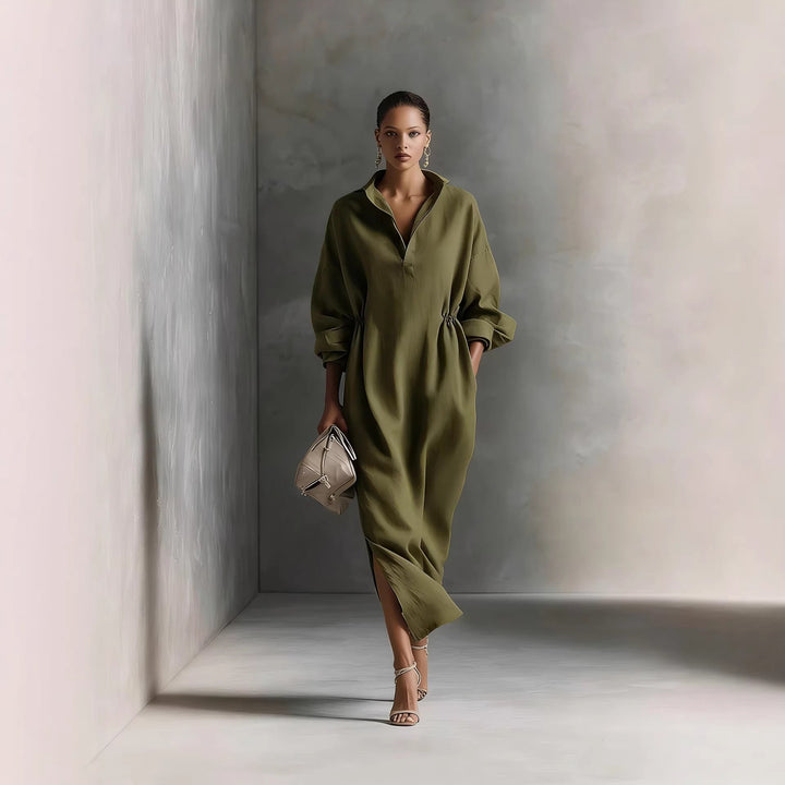 Chic midi dress for women featuring a classic collar, tie belt, & long sleeves, suitable for many occasions.