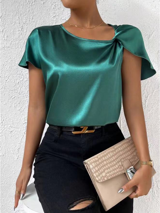 Chic women's solid t-shirt top. Fashionable round neck, short bell sleeves & elegant knot detail.