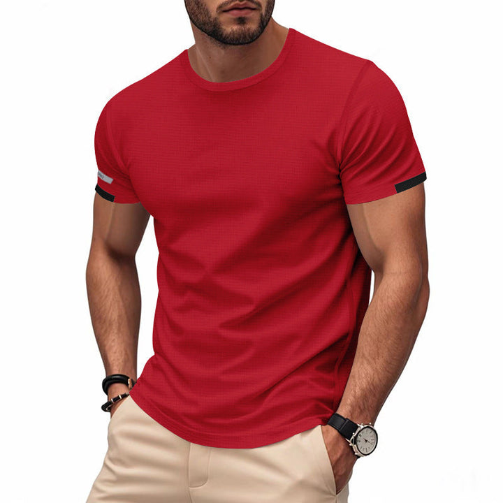 Men's quick-dry running shirt. Reflective & breathable performance top for intense workouts.