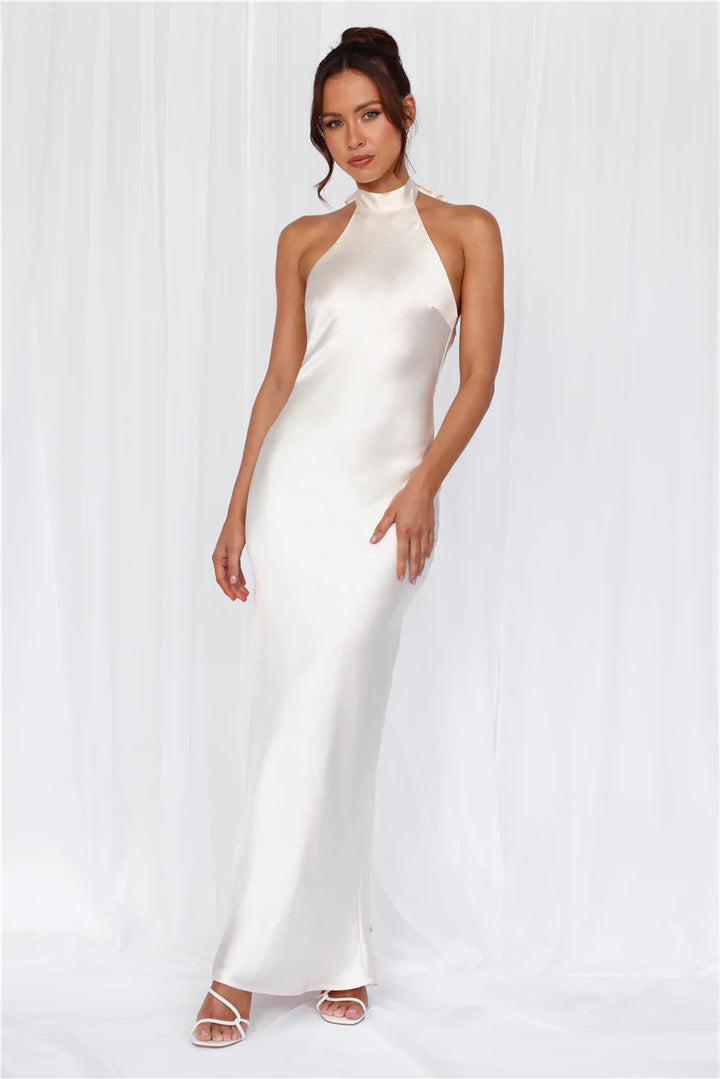 Elegant shimmering cocktail maxi dress, women's high neck formal wear for evening parties.