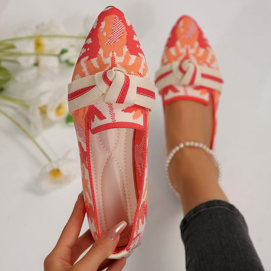 Stylish & comfortable women's slip-on ballet flats with a sleek pointed toe & cute bow for daily wear.