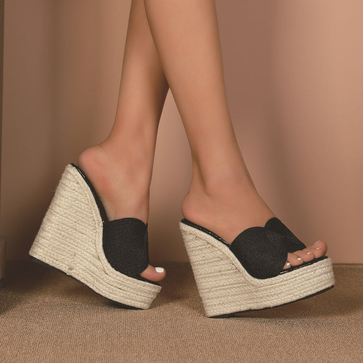 Chic women's wedge footwear with a modern design, offering elegant style and comfort for fashion.