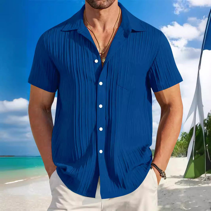 Comfortable men's relaxed fit short sleeve shirt, structured for a stylish beach look.